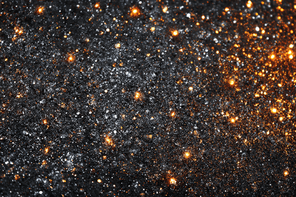 Black Gold Sparkle Texture: A Celestial Backdrop for Luxurious Designs